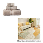 Brown and mountain rug / Three piece towel set